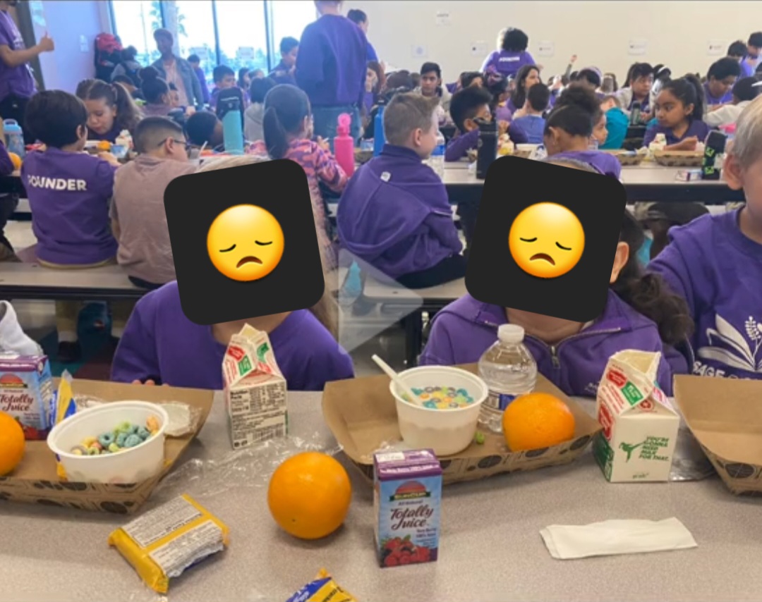 Picture of sad kids sitting in front of a breakfast loaded with sugar. Fruit loops, juice, orange, milk and honey graham crackers